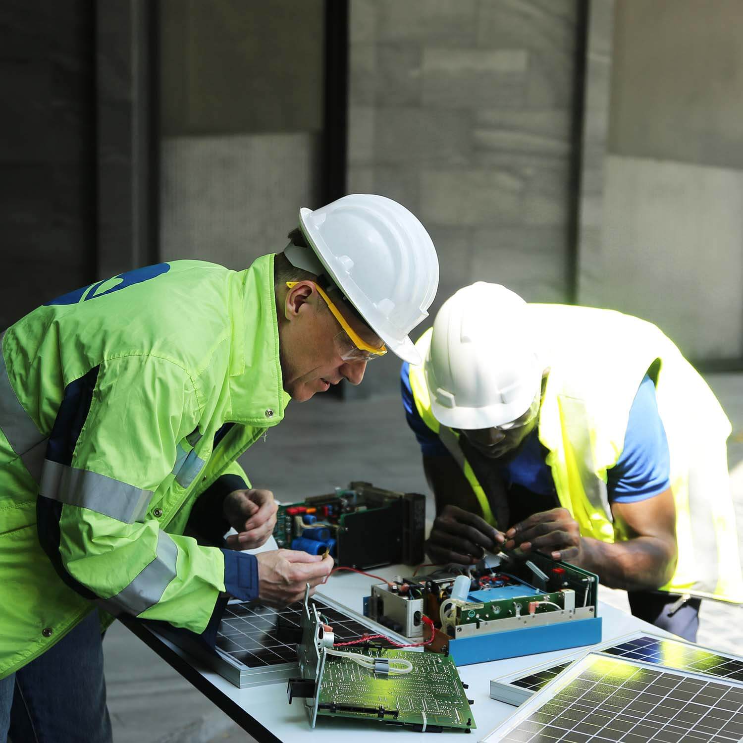 technicians maintenance solar panel and checking c BNCWZLY - ENERGYMONT Slovakia